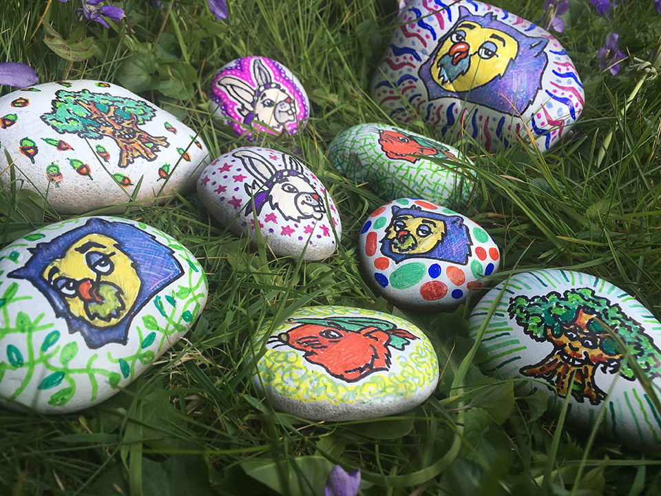 hand painted rocks featuring Robin Hood's Little Outlaws characters